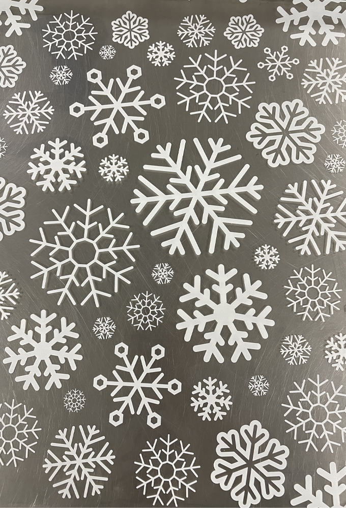 Cadeaufolie Transparant Witte Sneeuwvlokken 50cm x 50meter