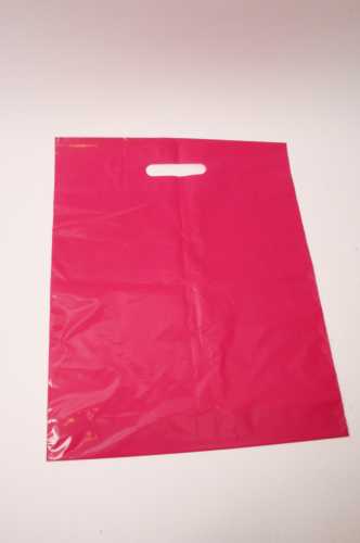 Plastic draagtassen Uni Magenta 35x4x44+2cm 50 mic 400 stuks